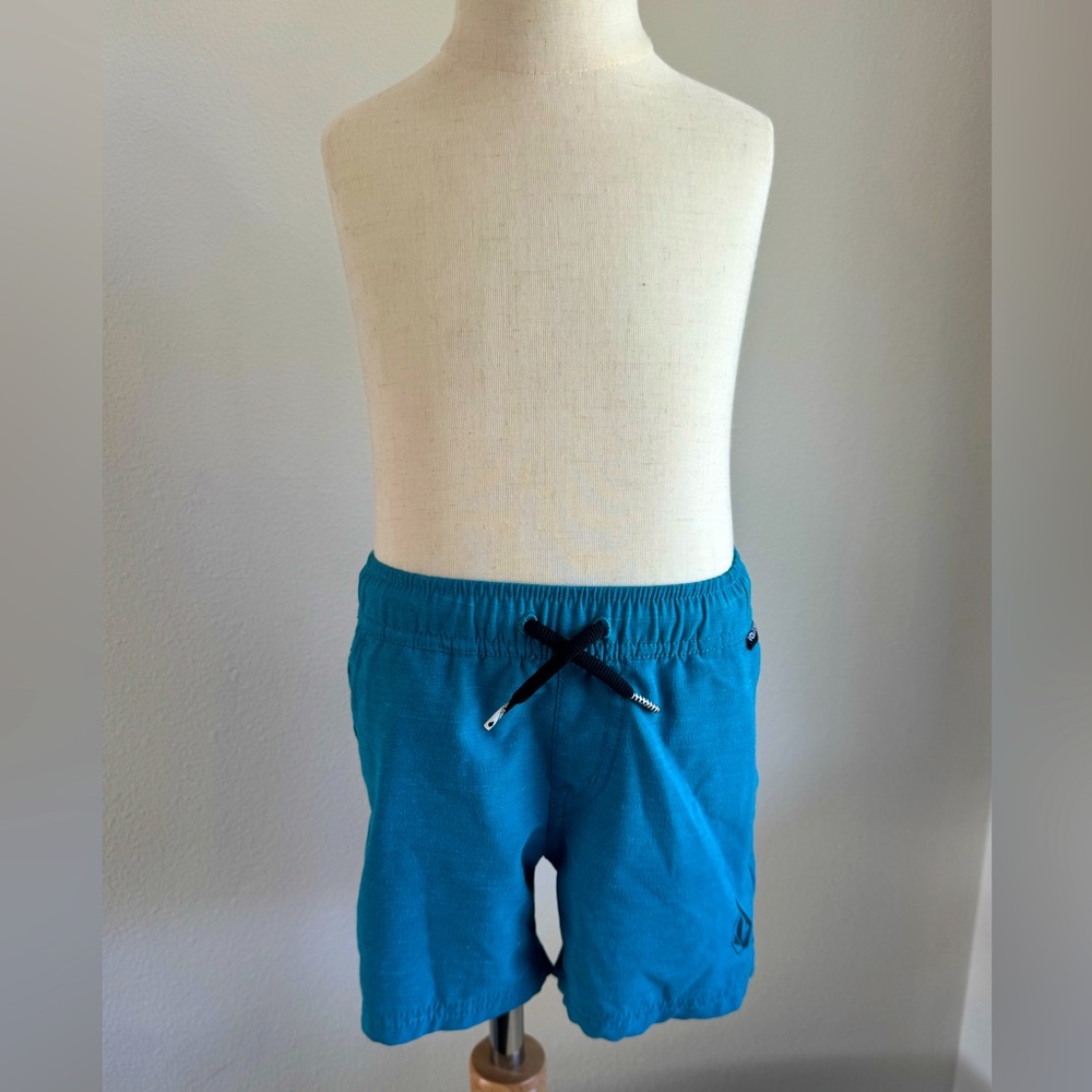 Volcom teal elastic band True to This shorts size 4T.
